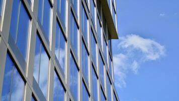 Modern building.Modern office building with facade of glass photo