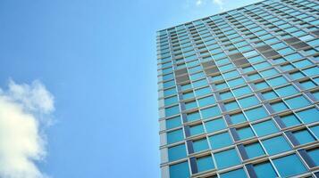 Modern building.Modern office building with facade of glass photo