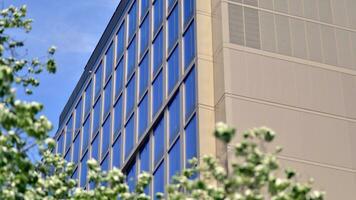 Modern building.Modern office building with facade of glass photo