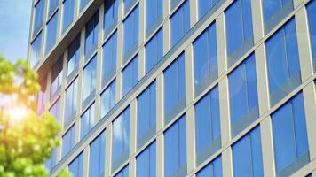 Modern building.Modern office building with facade of glass photo