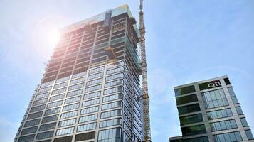 High-rise building under construction. Modern office building. photo