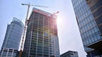 High-rise building under construction. Modern office building. photo