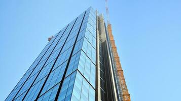 High-rise building under construction. Modern office building. photo