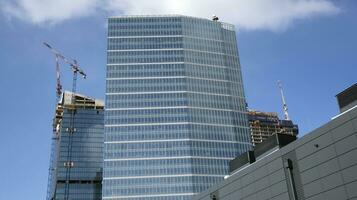 High-rise building under construction. Modern office building. photo