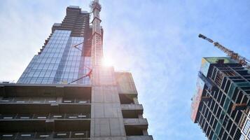 High-rise building under construction. Modern office building. photo