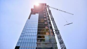 High-rise building under construction. Modern office building. photo