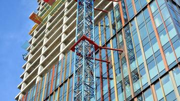 High-rise building under construction. Modern office building. photo