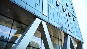 Combination of metal and glass wall material. Steel facade on columns. Abstract modern architecture. High-tech minimalist office building. Contemporary business architecture abstract fragment. photo
