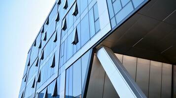 Combination of metal and glass wall material. Steel facade on columns. Abstract modern architecture. High-tech minimalist office building. Contemporary business architecture abstract fragment. photo