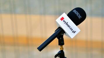 Warsaw, Poland. 24 October 2023. Microphone with the logo of the TV news  channel. Sign wyborcza.pl photo