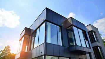 Office building with white aluminum composite panels. Facade wall made of glass and metal. Abstract modern business architecture. photo