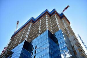 High-rise building under construction. Modern office building. photo