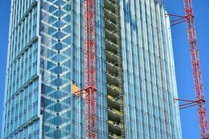 High-rise building under construction. Modern office building. photo