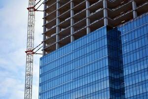 High-rise building under construction. Modern office building. photo