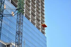 High-rise building under construction. Modern office building. photo