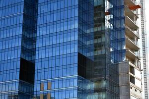 High-rise building under construction. Modern office building. photo