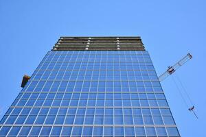 High-rise building under construction. Modern office building. photo