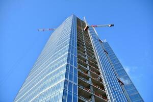 High-rise building under construction. Modern office building. photo