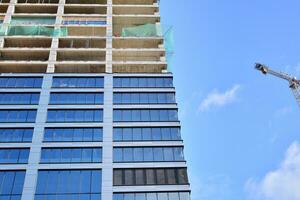 High-rise building under construction. Modern office building. photo