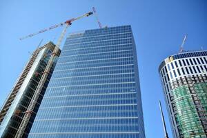 High-rise building under construction. Modern office building. photo