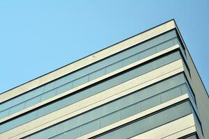 Modern apartment buildings on a sunny day with a blue sky. Facade of a modern apartment building photo