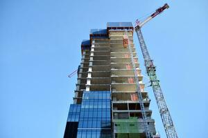 High-rise building under construction. Modern office building. photo