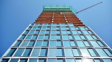 High-rise building under construction. Modern office building. photo