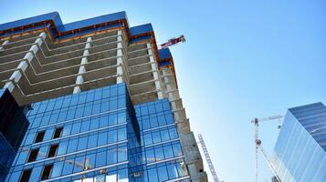 High-rise building under construction. Modern office building. photo