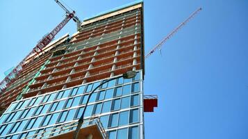 High-rise building under construction. Modern office building. photo