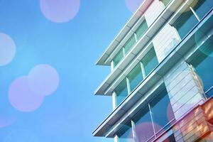 Modern apartment buildings on a sunny day with a blue sky. Facade of a modern apartment building photo