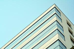 Residential Building on sky background. Facade of a modern housing construction with of balconies. photo