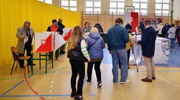 Warsaw, Poland 15 October 2023. Parliamentary elections in Poland. The process of voting at a polling station. photo