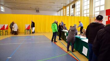 Warsaw, Poland 15 October 2023. Parliamentary elections in Poland. The process of voting at a polling station. photo