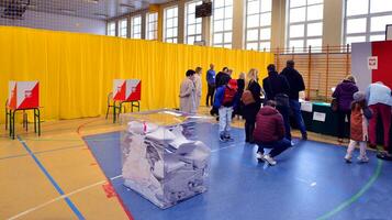 Warsaw, Poland 15 October 2023. Parliamentary elections in Poland. The process of voting at a polling station. photo