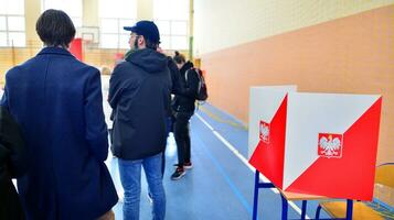 Warsaw, Poland 15 October 2023. Parliamentary elections in Poland. The process of voting at a polling station. photo