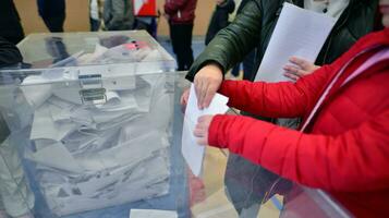 Warsaw, Poland 15 October 2023. Parliamentary elections in Poland. The process of voting at a polling station. photo