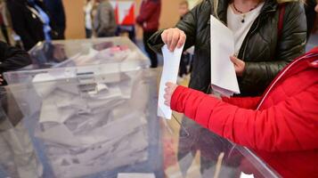 Warsaw, Poland 15 October 2023. Parliamentary elections in Poland. The process of voting at a polling station. photo