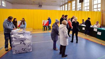 Warsaw, Poland 15 October 2023. Parliamentary elections in Poland. The process of voting at a polling station. photo