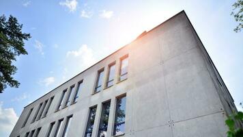 Corporate architecture building. New white modern office building photo