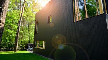 Luxury real estate single family house with modern facade. View during sunny day. photo