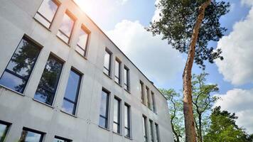 Corporate architecture building. New white modern office building photo
