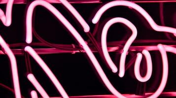 Glowing fragment of a neon sign, close-up, abstract background photo