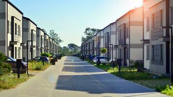 Brand new row of two story single family houses. Modern design of urban living residences. New development. photo