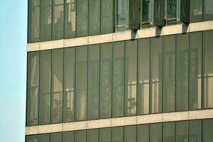 Cityscape with facade of a modern residential building. Modern European residential apartment building. photo