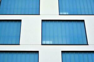 Cityscape with facade of a modern residential building. Modern European residential apartment building. photo