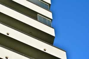 Cityscape with facade of a modern residential building. Modern European residential apartment building. photo