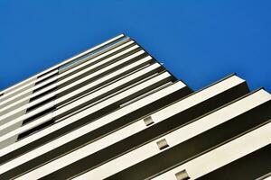 Cityscape with facade of a modern residential building. Modern European residential apartment building. photo