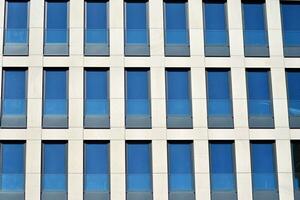 Cityscape with facade of a modern residential building. Modern European residential apartment building. photo