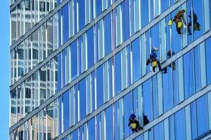 Cityscape with facade of a modern residential building. Modern European residential apartment building. photo