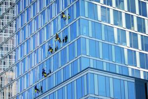 Cityscape with facade of a modern residential building. Modern European residential apartment building. photo